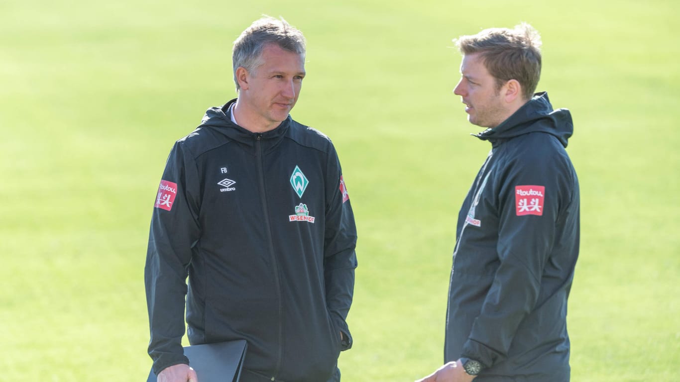 Stecken mit Werder Bremen in aktuter Abstiegsgefahr: Bremens Sport-Geschäftsführer Frank Baumann und Trainer Florian Kohfeldt.