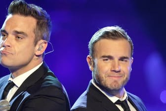 Robbie Williams (l) und Gary Barlow bei der Casting-Show "Popstars - Girls Forever" 2010 in Köln.
