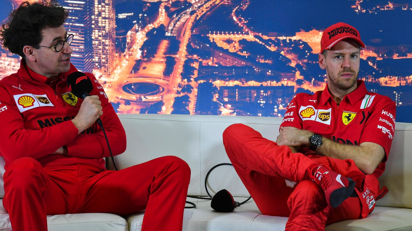 Ferrari-Teamchef Binotto (li.) und Vettel: Das Verhältnis gilt als beschädigt.
