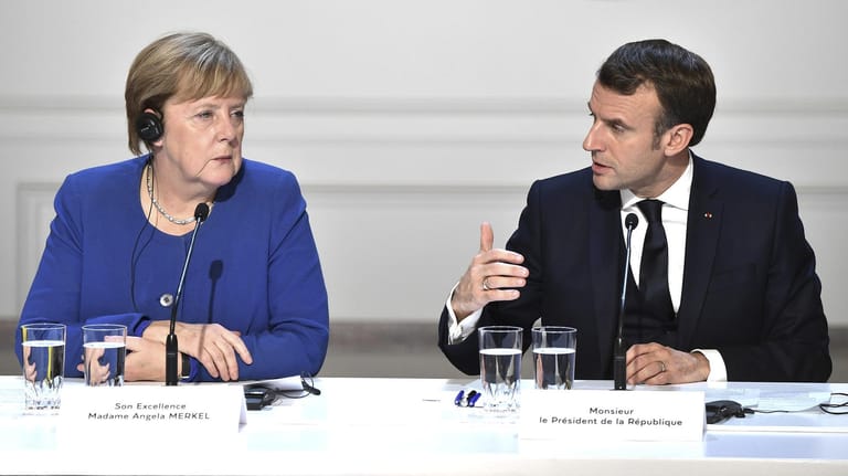 Bundeskanzlerin Angela Merkel und Frankreichs Präsident: Macron soll sich mit den Befürwortern von Corona-Bonds zu einer Koalition gegen Deutschland verbündet haben.