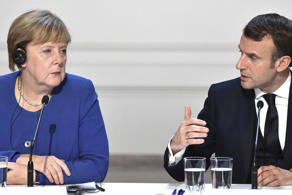 Gespräch über europäische Aufgaben in der Corona-Krise: Angela Merkel und Emmanuel Macron (hier bei einem Treffen im Dezember in Paris) haben am Montag telefoniert.