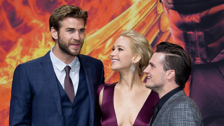 Liam Hemsworth, Jennifer Lawrence und Josh Hutcherson: Die drei Schauspieler besetzten die Hauptrollen. Der neue Cast zur Verfilmung des neusten Bands ist noch nicht bekannt.