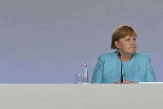 Söder und Merkel sprechen bei einer Pressekonferenz