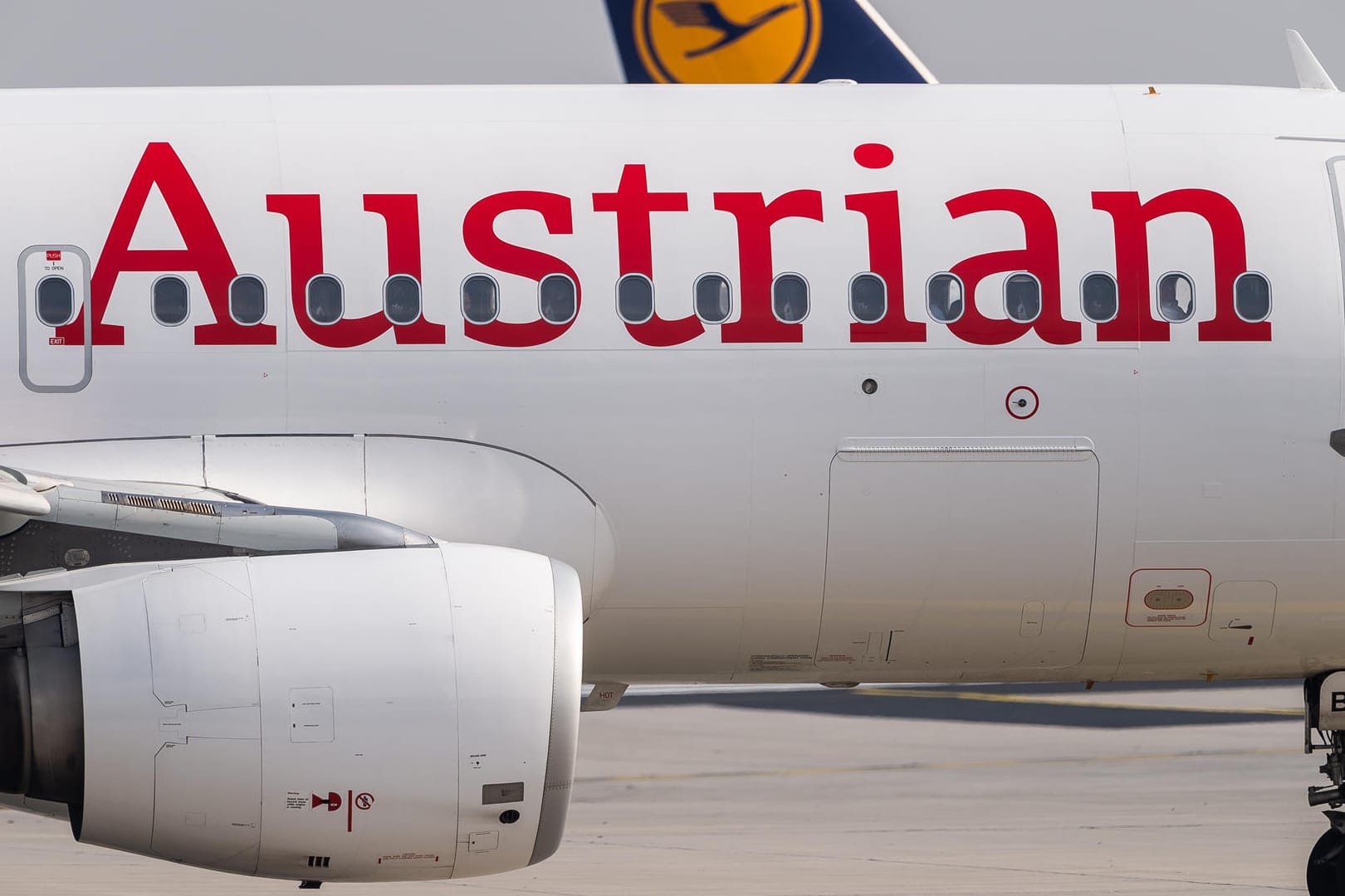 Austrian Airlines: Die Rettung der Lufthansa-Tochter ist mit Klimazielen verbunden. Unter anderem soll es keine Billigst-Tickets mehr geben.