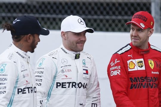 Die Stars der Formel 1: Die Mercedes-Fahrer Lewis Hamilton (l) und Valtteri Bottas (M) sowie Ferarri-Pilot Sebastian Vettel.