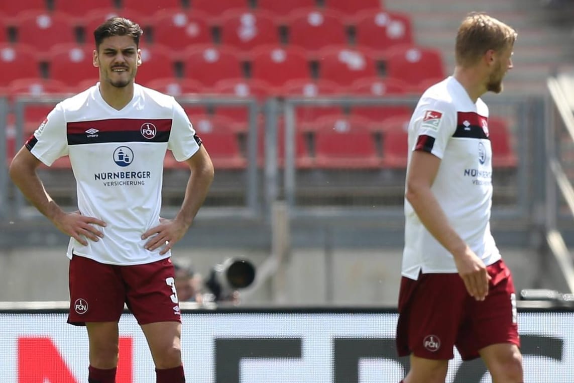 Konstantinos Mavropanos (l.) und Hanno Behrens: Die Nürnberg-Profis stehen unter großem Druck.