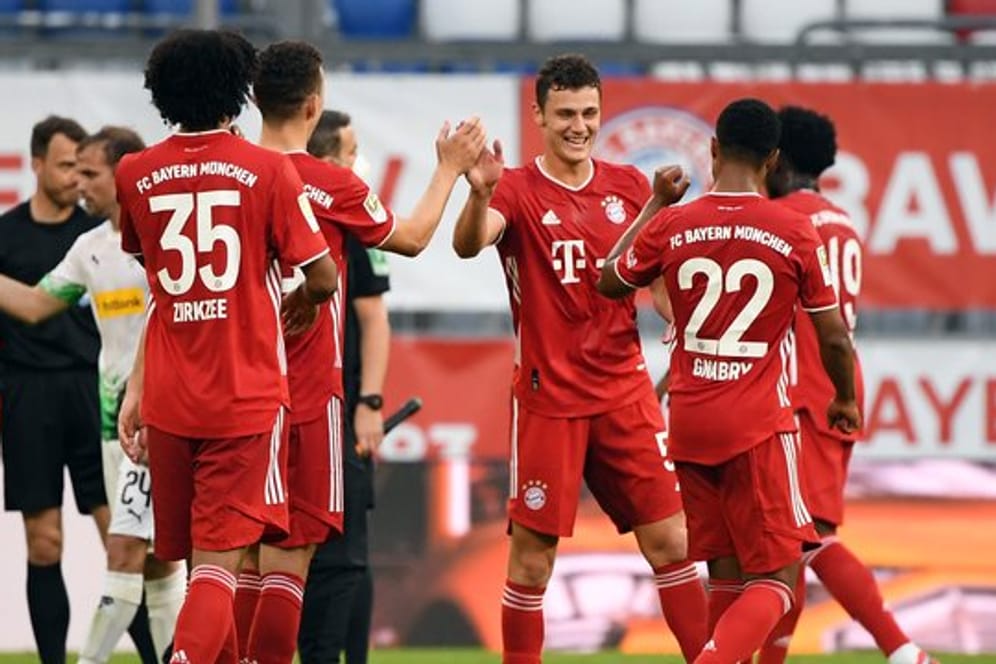 Nach dem Sieg gegen Gladbach wollen die Bayern-Profis den Meistertitel gegen Bremen perfekt machen.