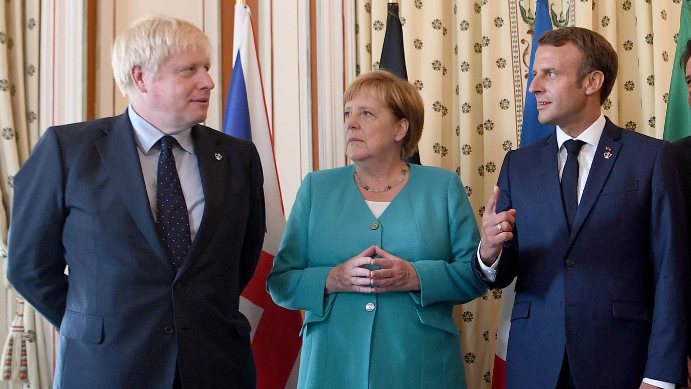 Boris Johnson, Angela Merkel und Emmanuel Macron: Besonders Menschen mit wenig Einkommen und Arbeitslose fühlen sich nicht von den etablierten Parteien vertreten.