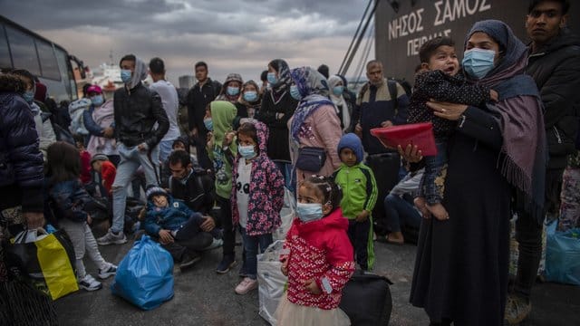 Flüchtlinge aus dem Lager Moria auf Lesbos: Die Asylreform war jahrelang kaum vorangekommen. Flüchtlinge aus dem Lager Moria auf Lesbos: Die Asylreform war jahrelang kaum vorangekommen.