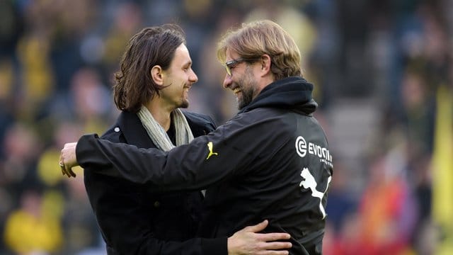 Wünscht sich, dass Jürgen Klopp (r) einmal Bundestrainer wird: Neven Subotic (l).