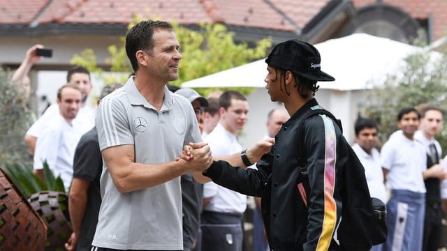 Oliver Bierhoff (l) und Leroy Sané.