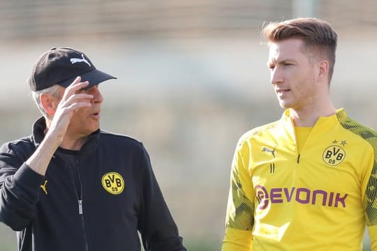 Stellt BVB-Coach Lucien Favre (l) ein gutes Zeugnis aus: Kapitän Marco Reus.