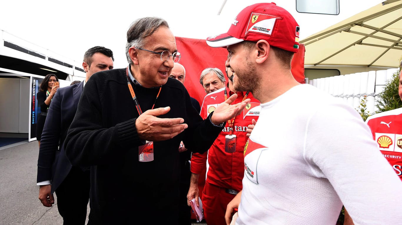 Anspruchsvoller Chef: Vettel (r.) mit dem damaligen Ferrari-Boss Sergio Marchionne.