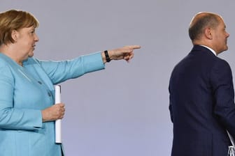 Bundeskanzlerin Angela Merkel und Finanzminister Olaf Scholz.