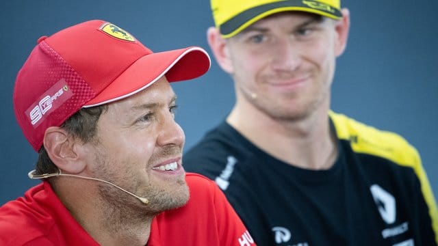 Freut sich über die Rückkehr von Nico Hülkenberg (r): Sebastian Vettel.