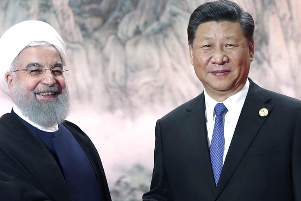 Hassan Ruhani und Xi Jinping: Der Iran hofft auf ein umfangreiches Abkommen mit China – auch um Druck auf die USA auszuüben?