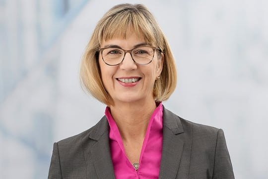 Dr.