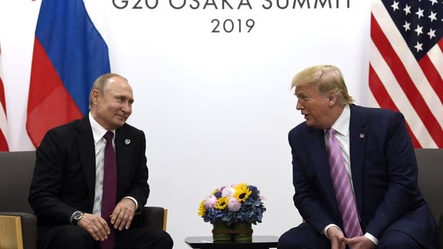 Wladimir Putin (l. Wladimir Putin (l.