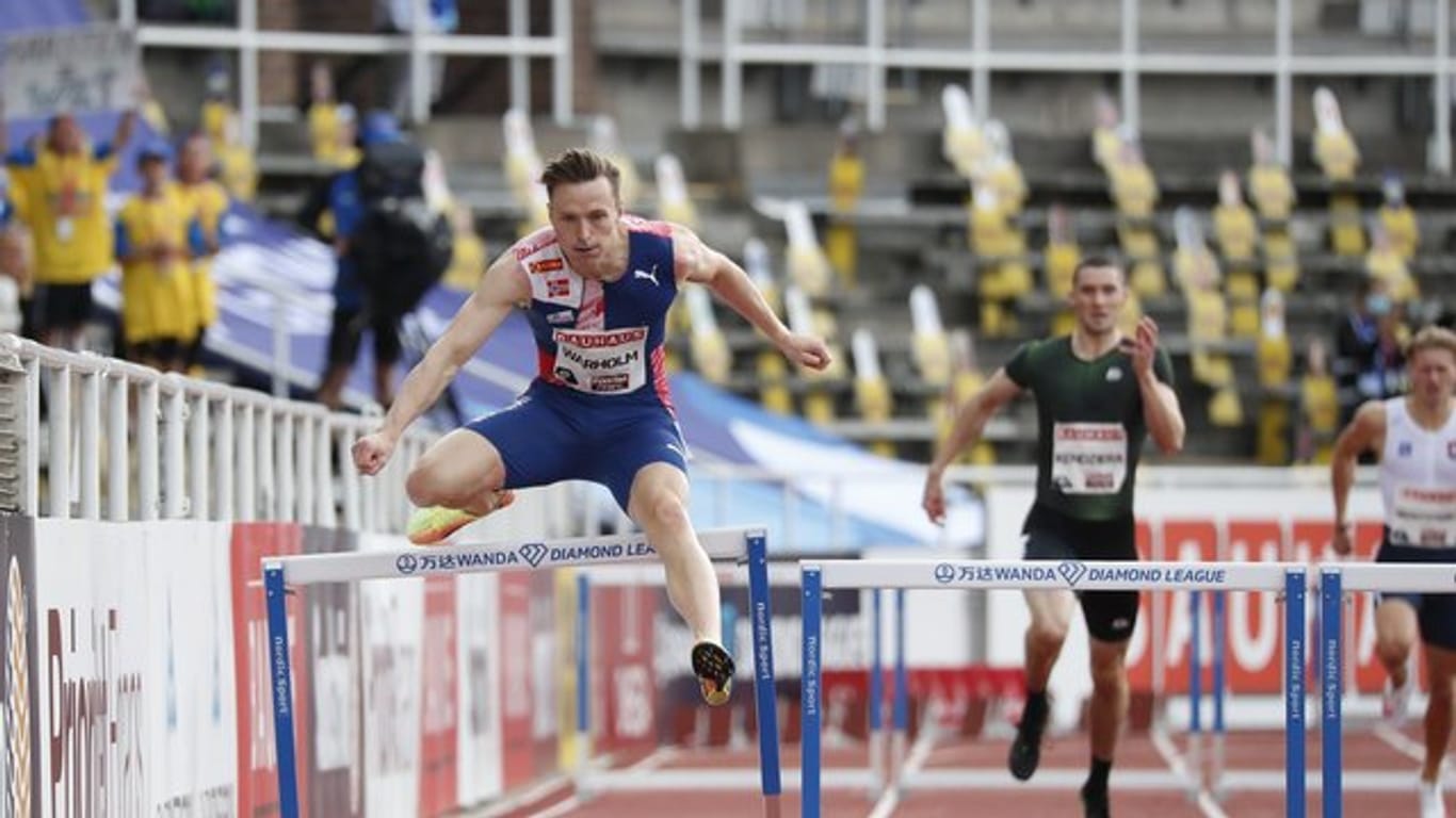 Karsten Warholm (l) hat seinen Europarekord über 400 Meter Hürden verbessert.