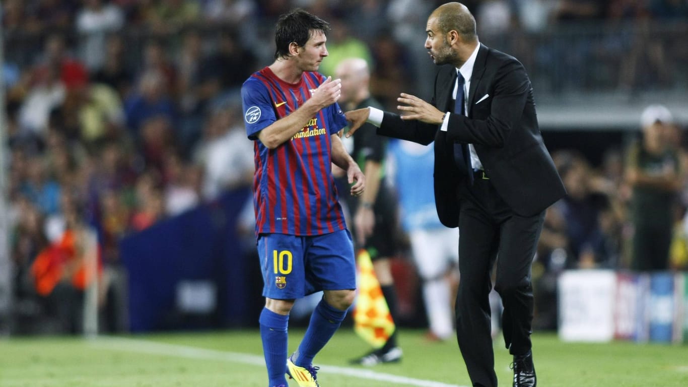 Lionel Messi (l.) 2011 im Gespräch mit Pep Guardiola.