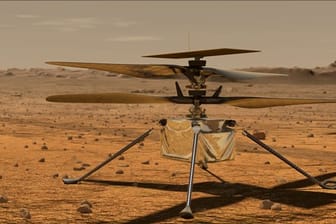 Diese von der NASA zur Verfügung gestellte Illustration zeigt den Mini-Hubschrauber "Ingenuity" auf der Marsoberfläche.