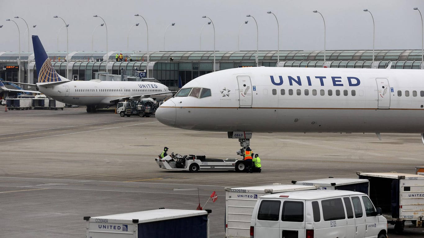 April 13, 2021: A United Airlines jet is taxied to the gate at O Hare International Airport on January 3, 2020, in Chica