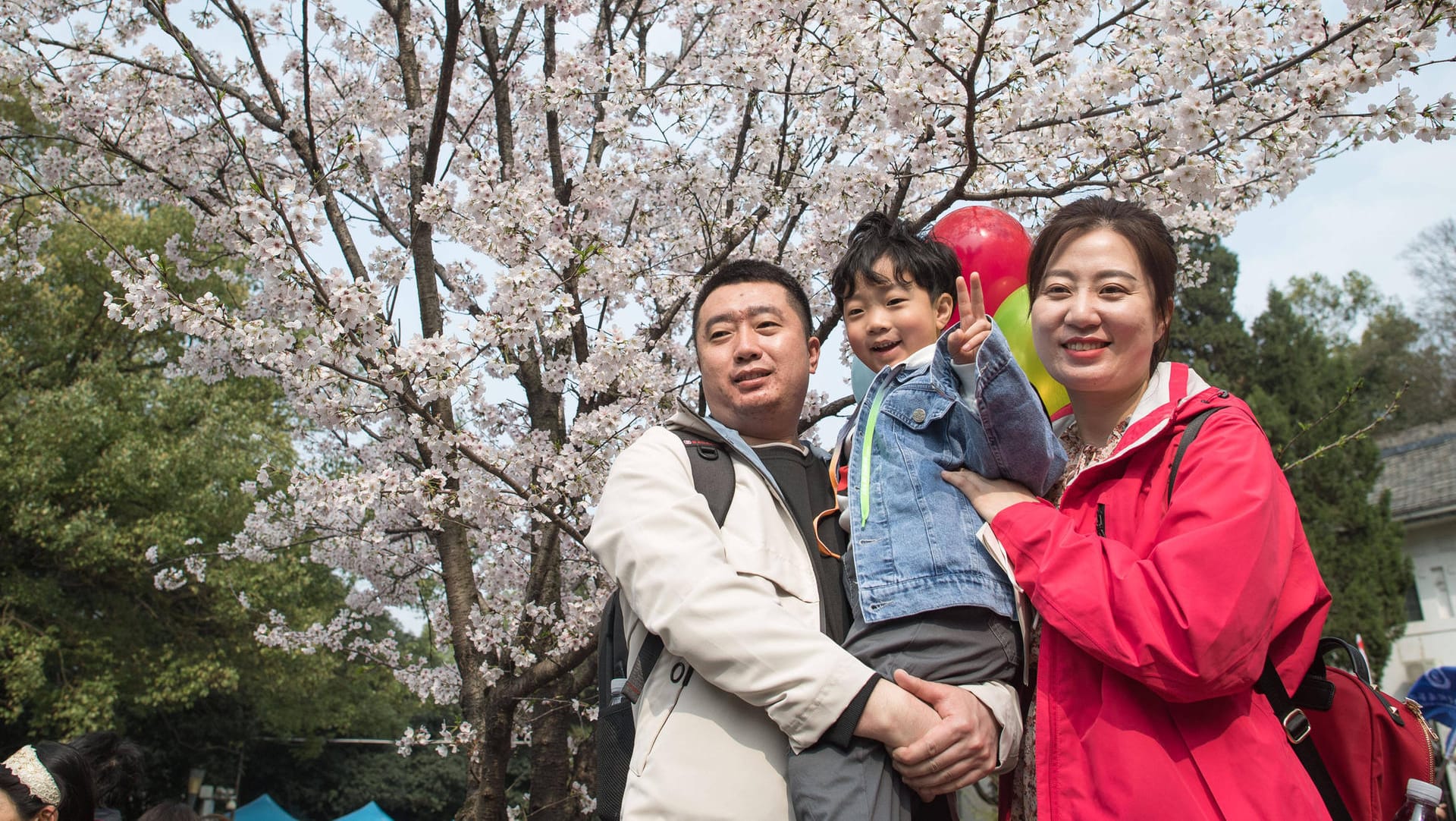 Eine chinesische Familie in Wuhan: Künftig sind Paaren drei Kinder erlaubt.