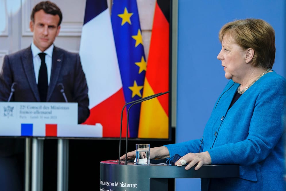 Kanzlerin Angela Merkel und Frankreichs Präsident Emmanuel Macron: "vollständige Offenheit und Klärung des Sachverhalts".