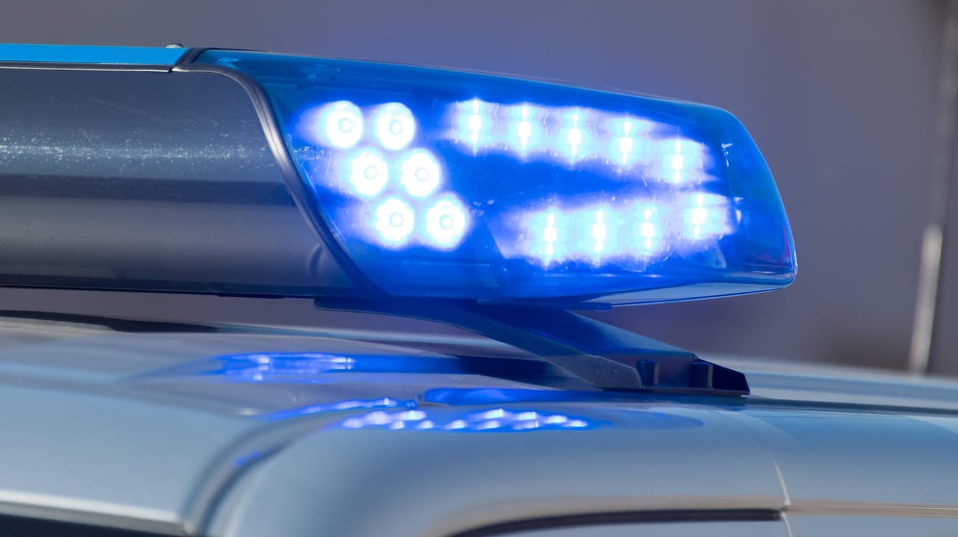 Detail shot of a glowing blue light on a police car Detail shot of a glowing blue light on a police