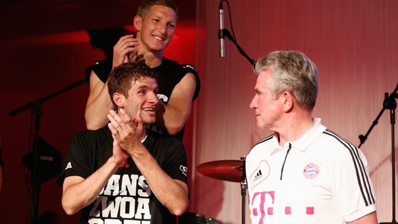 Holten mit dem FC Bayern 2013 das Triple: Thomas Müller (l) und Jupp Heynckes.