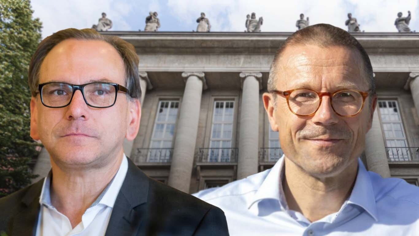 Andreas Mucke (li., SPD) ist amtierender Oberbürgermeister von Wuppertal: Sein Herausforderer Uwe Schneidewind (re.) wird von der CDU und den Grünen unterstützt.