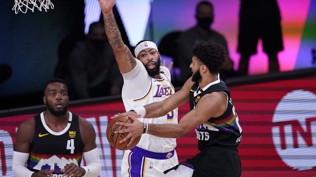 Jamal Murray (r) führte die Denver Nuggets zum Sieg.