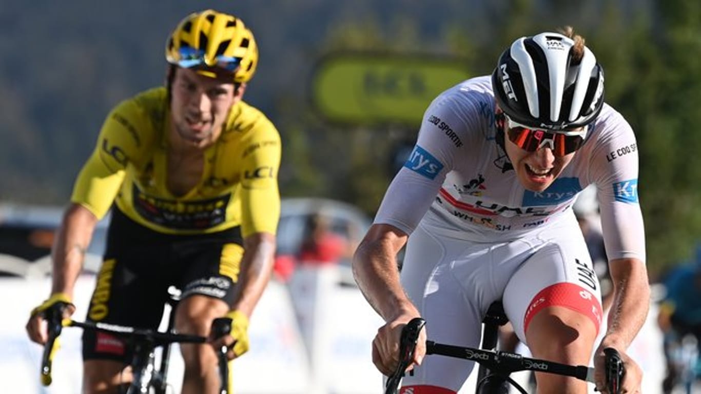 Tadej Pogacar (r) und sein slowenischer Landsmann Primoz Roglic wollen bei der Straßenrad-WM um den Sieg mitfahren.