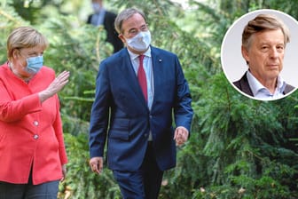 Kanzlerin Merkel und Armin Laschet: Wird der NRW-Ministerpräsident ihr Nachfolger? Das klärt sich noch nicht auf dem CDU-Parteitag im Dezember.