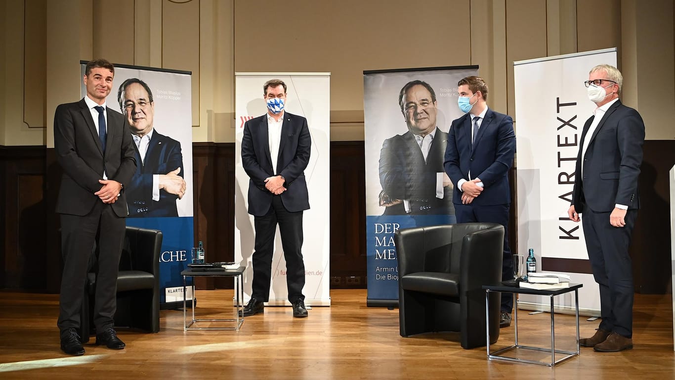 Berlin: Tobias Blasius (l-r), Autor, Ministerpräsident Markus Söder (CSU), Moritz Küpper, Autor, und Jörg Quoos, Chefredakteur FUNKE Zentralredaktion, stellen die Biografie von Armin Laschet vor.