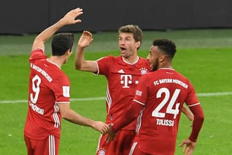 Thomas Müller, Robert Lewandowski und Corentin Tolisso: Das Duell zwischen dem FCB und BVB war lange offen