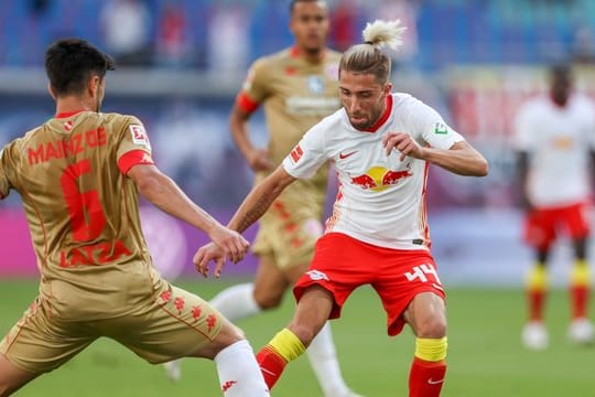 Kevin Kampl (r) hat die Hoffnung nicht aufgegeben, dass die Serie des FC Bayern München zeitnah endet.