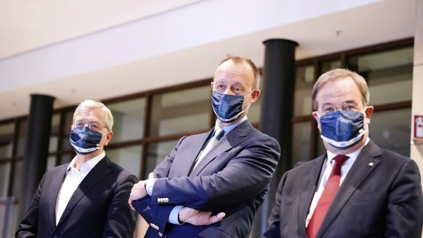 Die drei Kandidaten für den Bundesvorsitz der CDU: Armin Laschet, (r-l) Friedrich Merz und Norbert Röttgen.