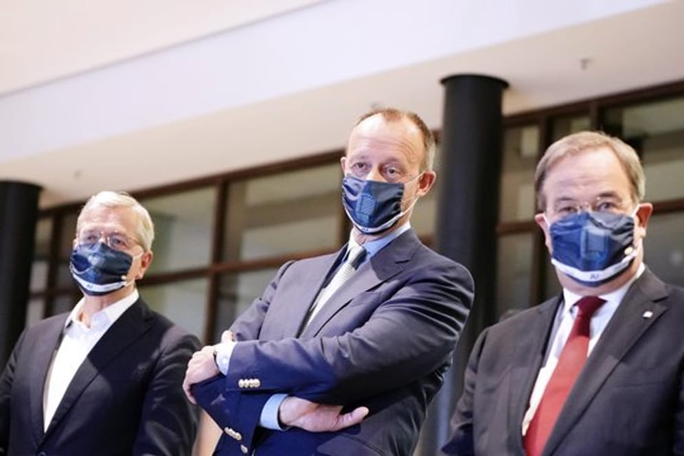 Die drei Kandidaten für den Bundesvorsitz der CDU: Armin Laschet, (r-l) Friedrich Merz und Norbert Röttgen.