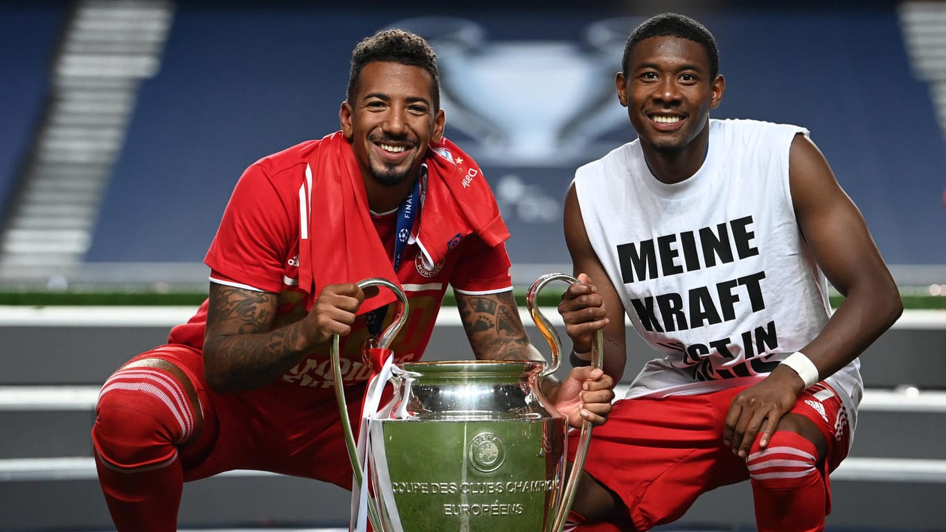 Jerome Boateng und David Alaba (v.l.): Bei einer Titelverteidigung in der Königsklasse würden die Bayern-Stars weniger Siegprämie kassieren.