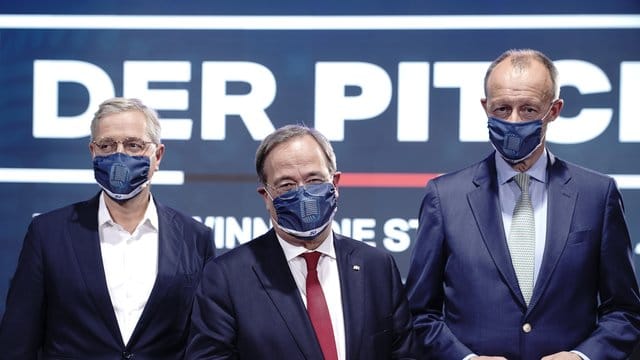 Die Kandidaten für den Bundesvorsitz der CDU, Norbert Röttgen (L), Armin Laschet und Friedrich Merz (R).