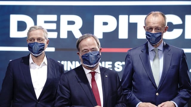 Die Kandidaten für den CDU-Bundesvorsitz: Armin Laschet zwischen Friedrich Merz (R) und Norbert Röttgen. Die Kandidaten für den CDU-Bundesvorsitz: Armin Laschet zwischen Friedrich Merz (R) und Norbert Röttgen.