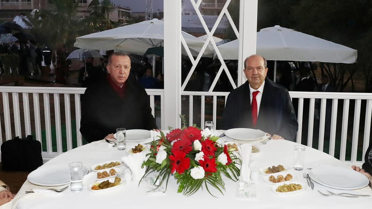 Turkish President Tayyip Erdogan and Turkish Cypriot leader Ersin Tatar visit an area fenced off by the Turkish military since 1974 in the abandoned coastal settlement of Varosha Turkish President Tayyip Erdogan and Turkish Cypriot leader Ersin Tatar visit an area fenced off by the Turkish military since 1974 in the abandoned coastal settlement of Varosha