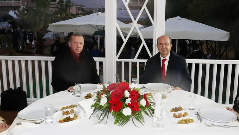 Turkish President Tayyip Erdogan and Turkish Cypriot leader Ersin Tatar visit an area fenced off by the Turkish military since 1974 in the abandoned coastal settlement of Varosha