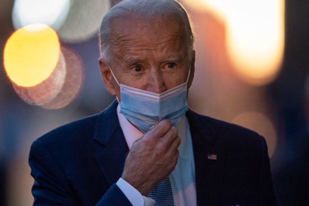 Will die Amerikaner dazu aufrufen, 100 Tage lang Masken in der Öffentlichkeit zu tragen: Der gewählte Präsident (President-elect) Joe Biden.