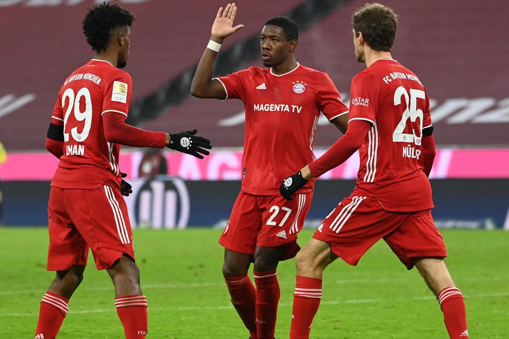 Jubel: Bayerns Thomas Müller jubelt mit seinen Teamkollegen David Alaba und Kingsley Coman (v. r.).