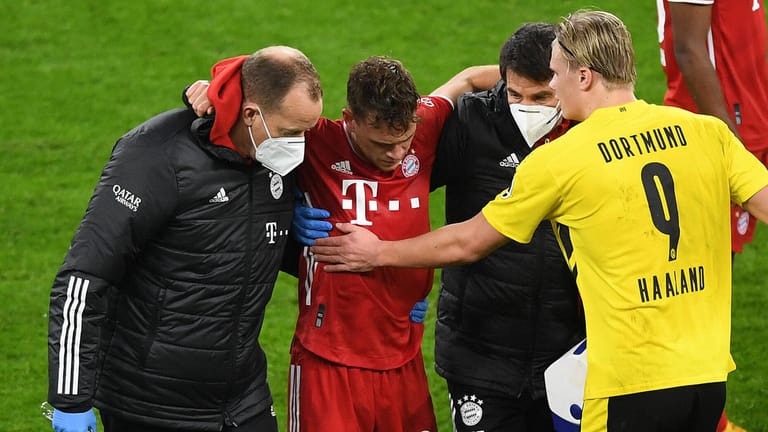 Joshua Kimmich: Im Topspiel gegen den BVB verletzte sich der Nationalspieler schwer am Knie, wurde unter anderem von Erling Haaland getröstet (re.).