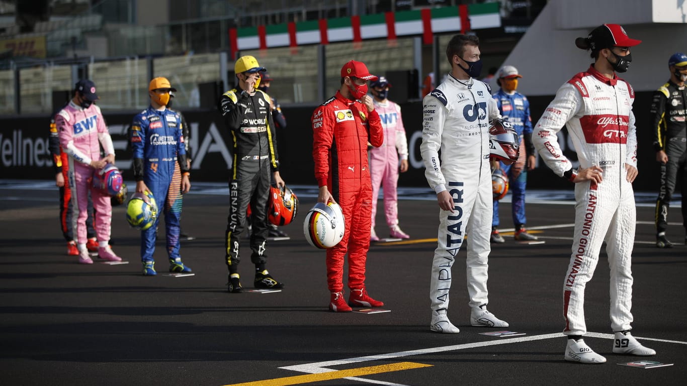 Fahrerfeld der Formel 1: Sebastian Vettel (M.) fuhr eine unglückliche Saison.