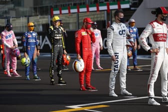 Fahrerfeld der Formel 1: Sebastian Vettel (M.) fuhr eine unglückliche Saison.