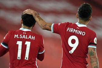 Mohamed Salah (l) und Roberto Firmino machten mit ihren Toren den Liverpool-Sieg gegen Tottenham perfekt.